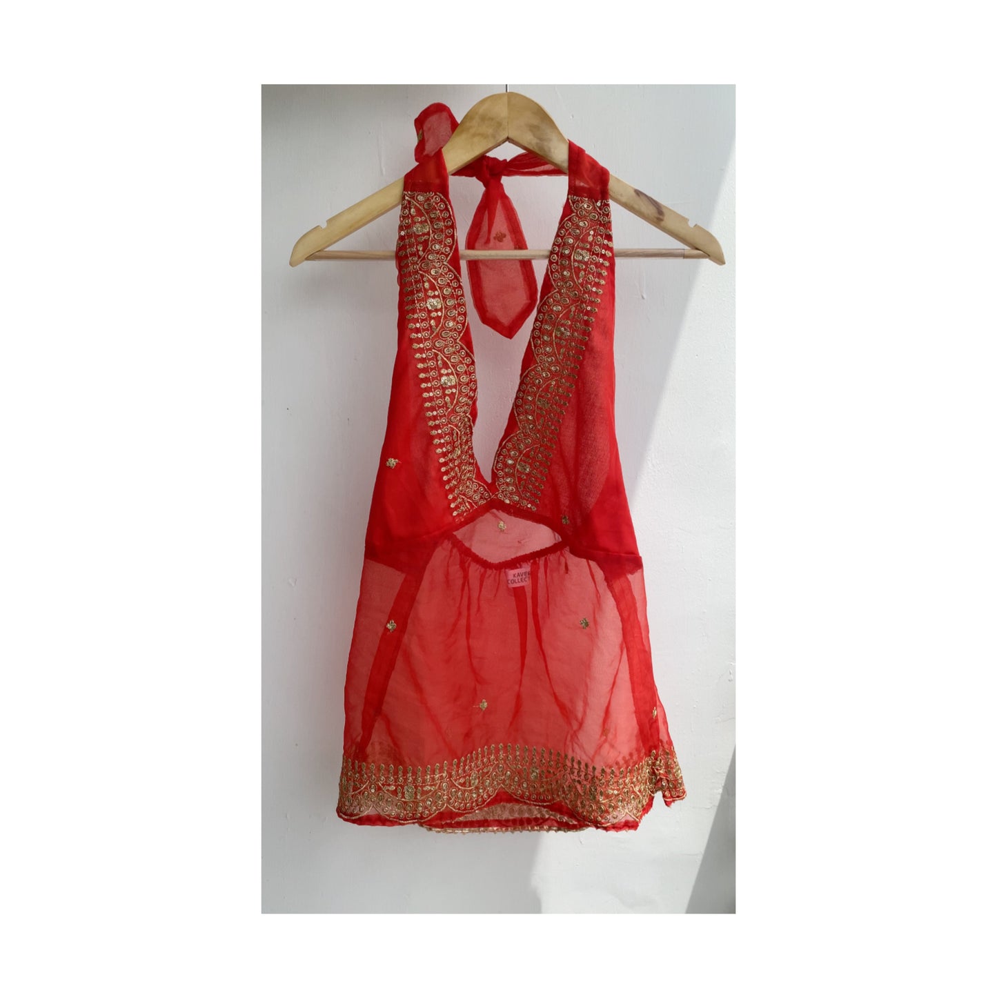 Red with golden work halter neck