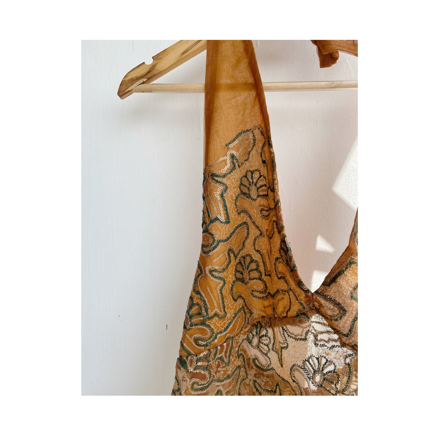 Golden brown with embroidery and red border