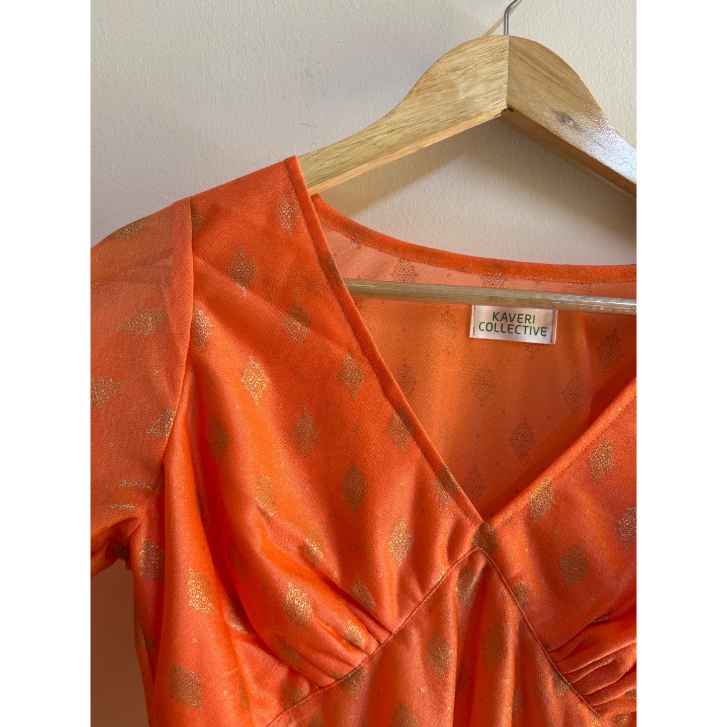 Orange golden weave top