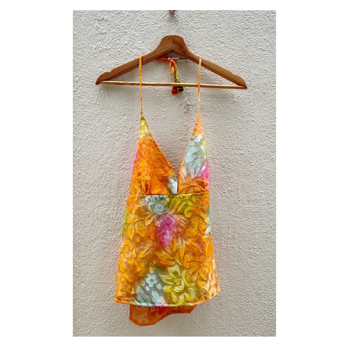 Orange floral textured top