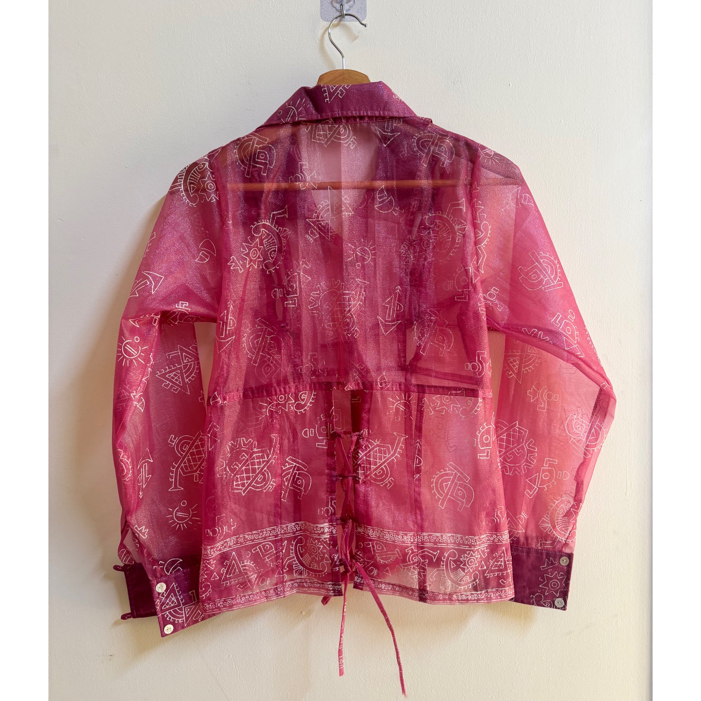 Tribal motif pink shirt