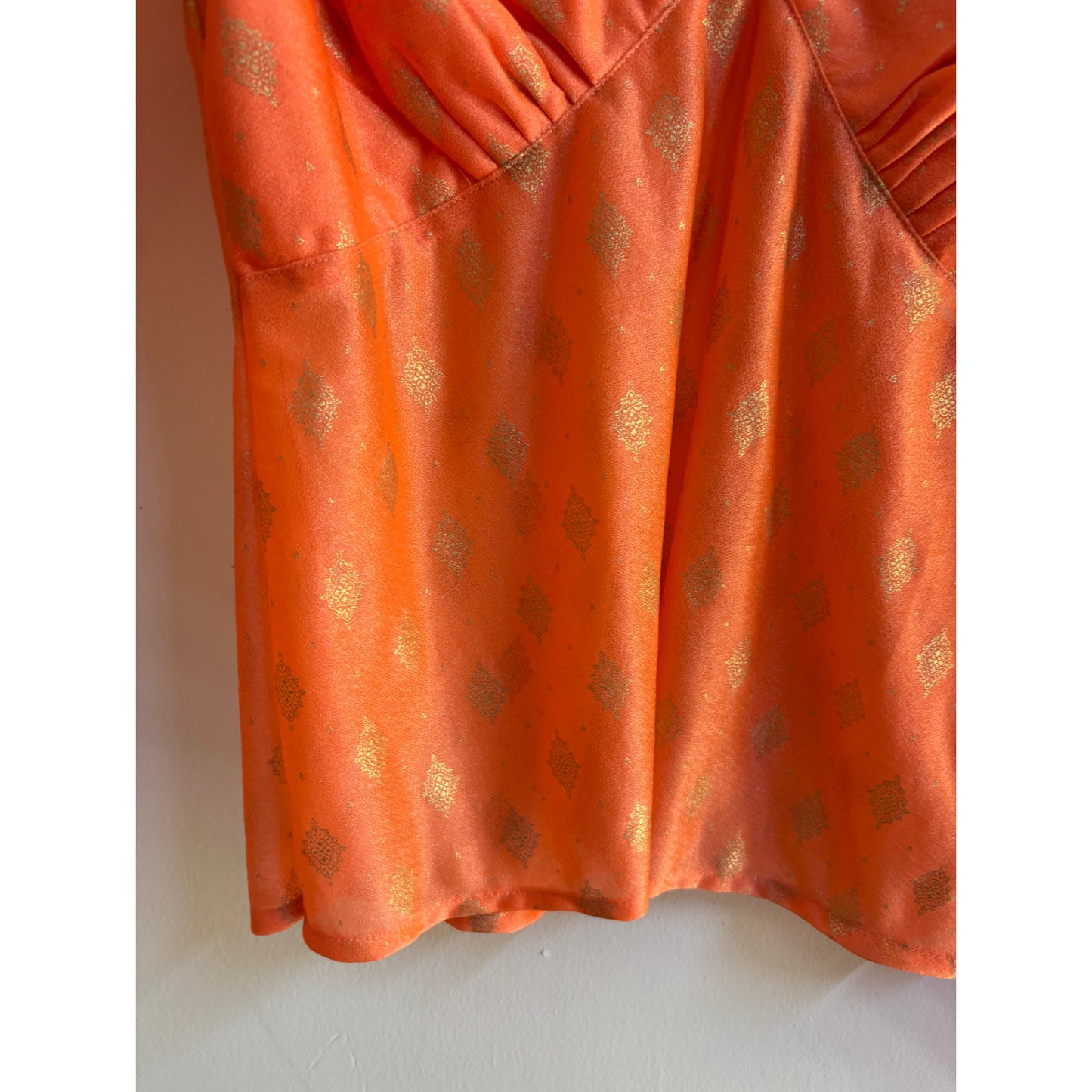 Orange golden weave top