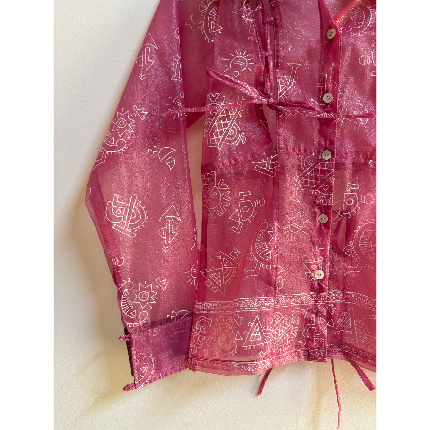 Tribal motif pink shirt