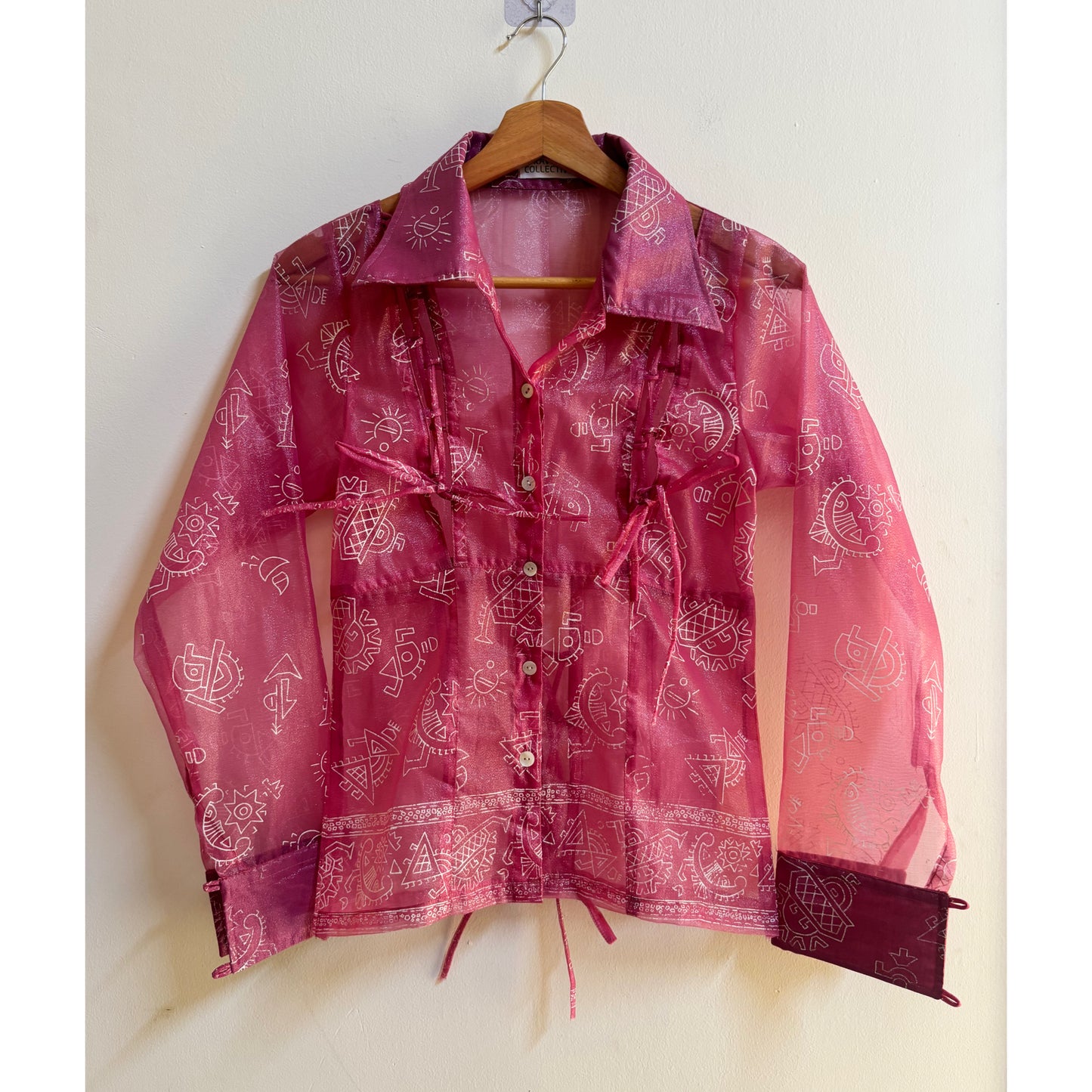 Tribal motif pink shirt