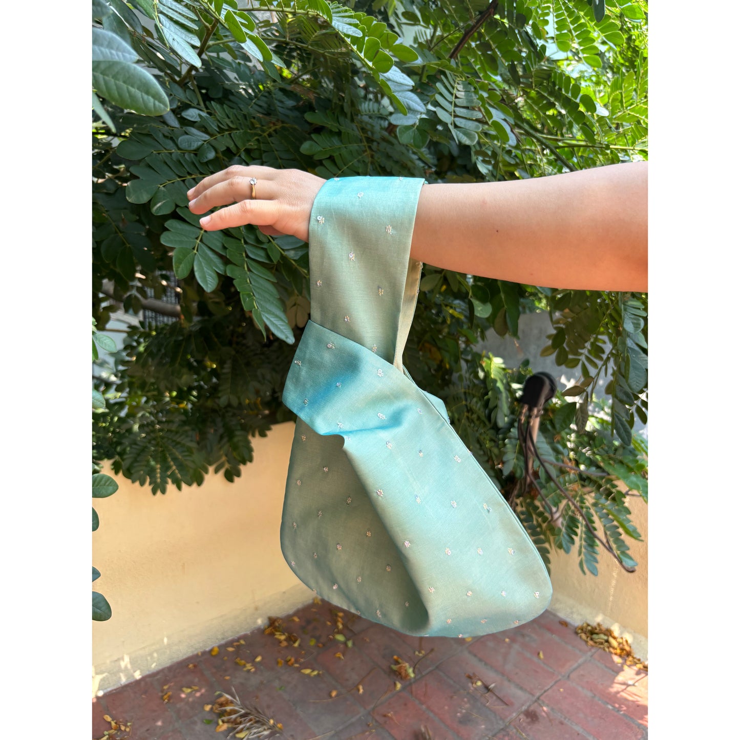 Green silver weave potli bag