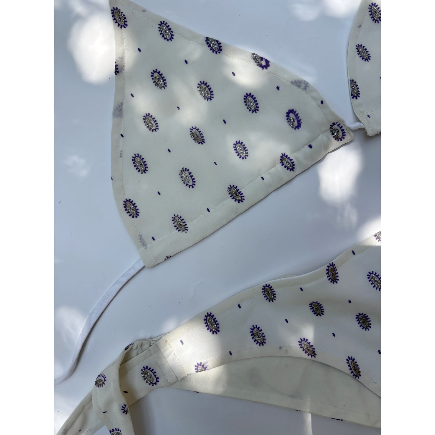 White with purple motif bikini