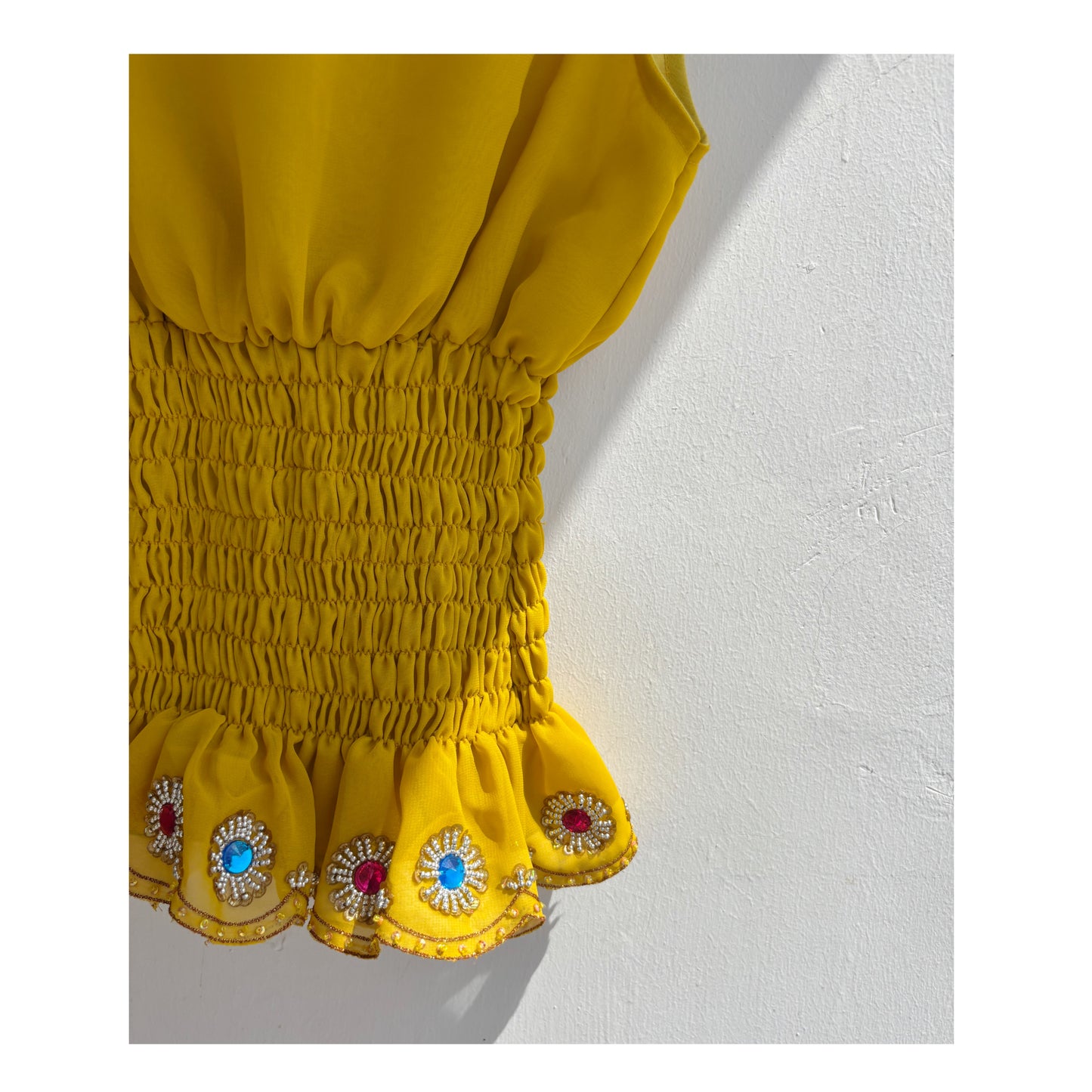 Yellow bead work top