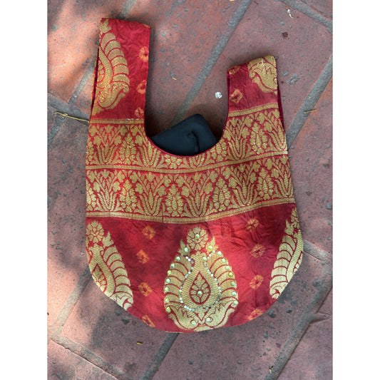 Red gold with bead work potli bag